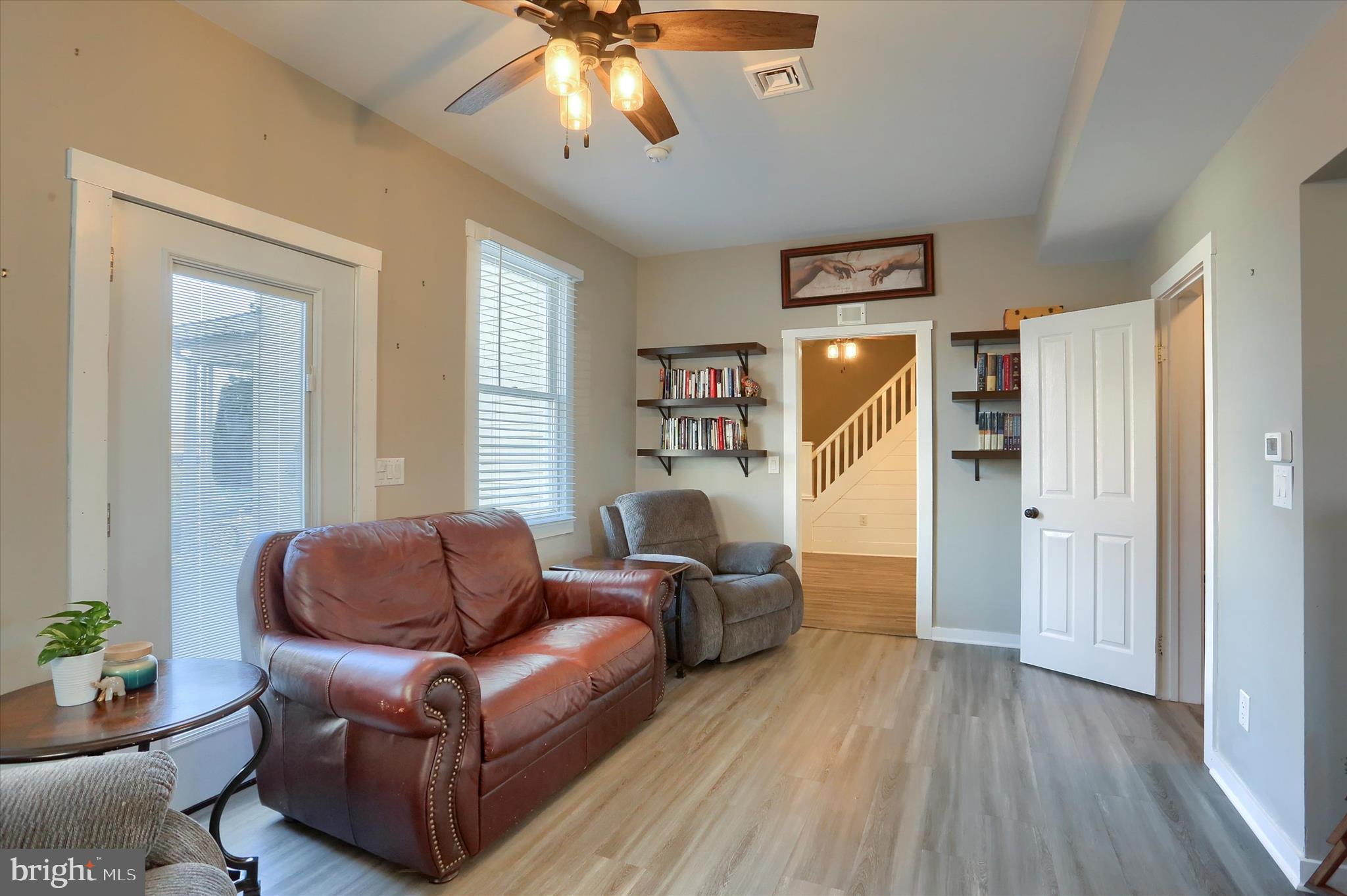 1544 Lafayette Street Lebanon, PA 17042 - Photo 7 of 49 a living room with furniture and a wooden floor