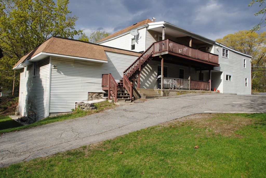 16 Hartness Road, Unit B Sutton, MA 01590 - Photo 15 of 16 a view of a house with a park
