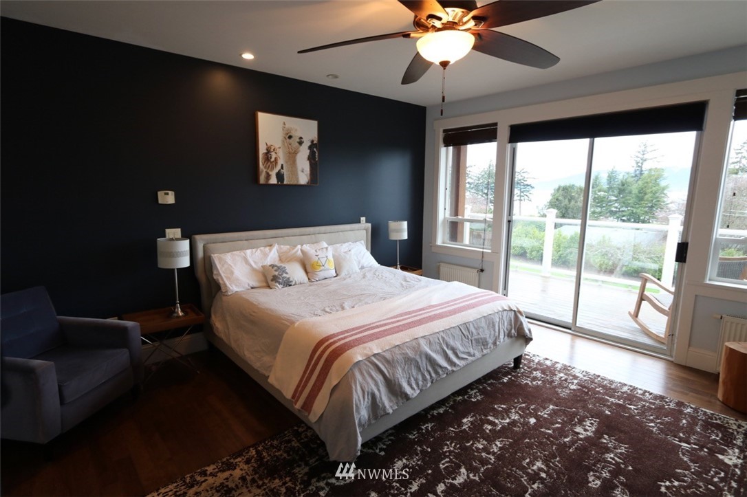530 Briar Road Bellingham, WA 98225 - Photo 11 of 40 a bedroom with a large bed and a large window