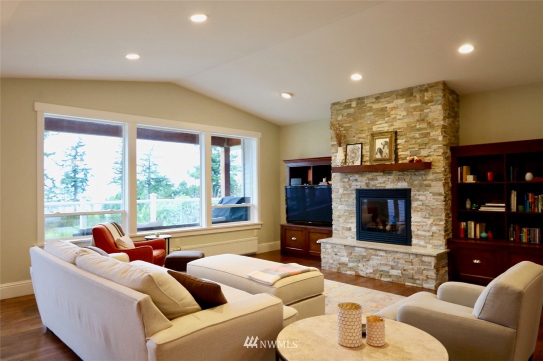 530 Briar Road Bellingham, WA 98225 - Photo 3 of 40 a living room with furniture fireplace and a large window