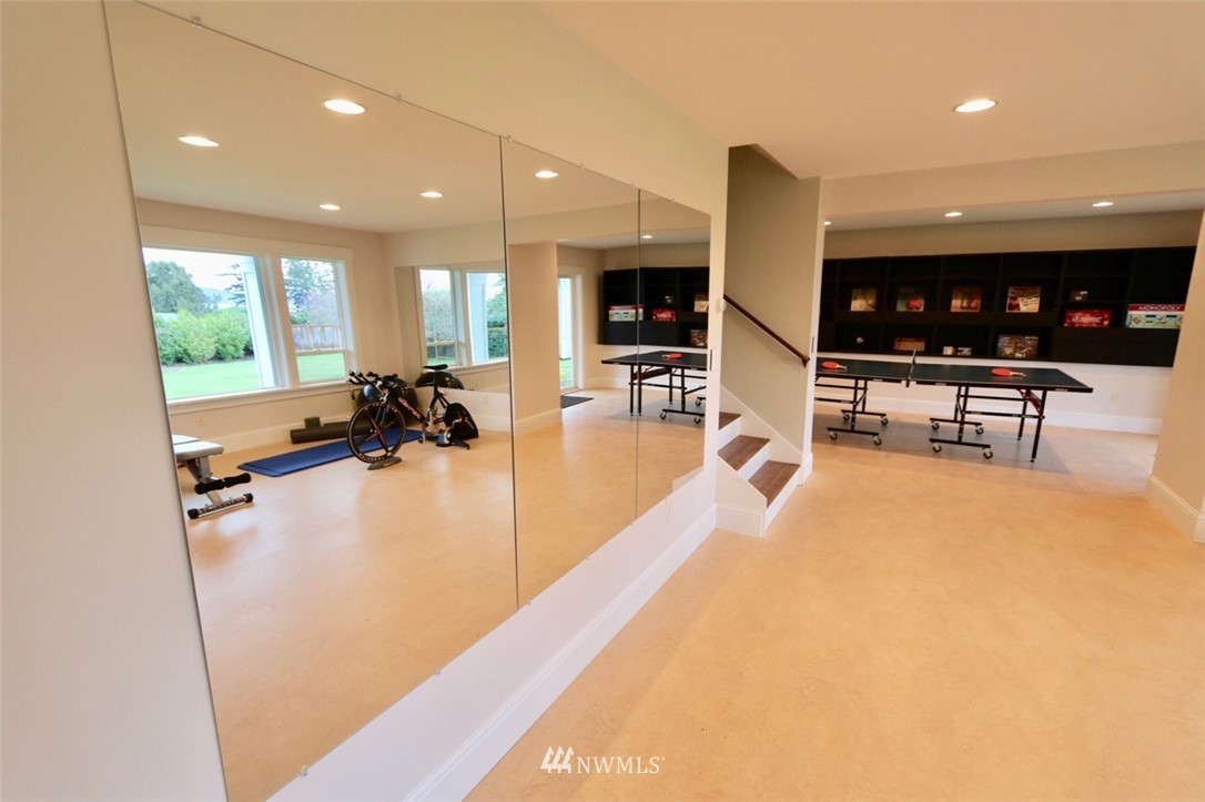530 Briar Road Bellingham, WA 98225 - Photo 26 of 40 a living room with furniture and a large mirror