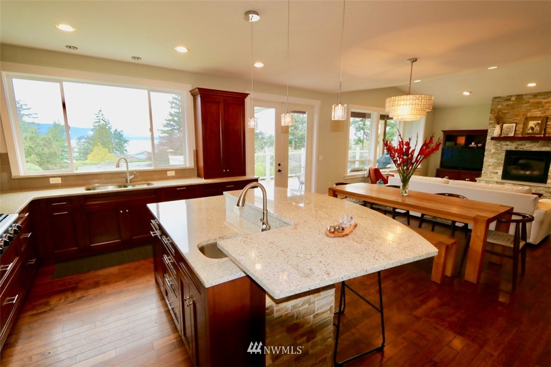 530 Briar Road Bellingham, WA 98225 - Photo 8 of 40 a view of a dining room with furniture window and wooden floor