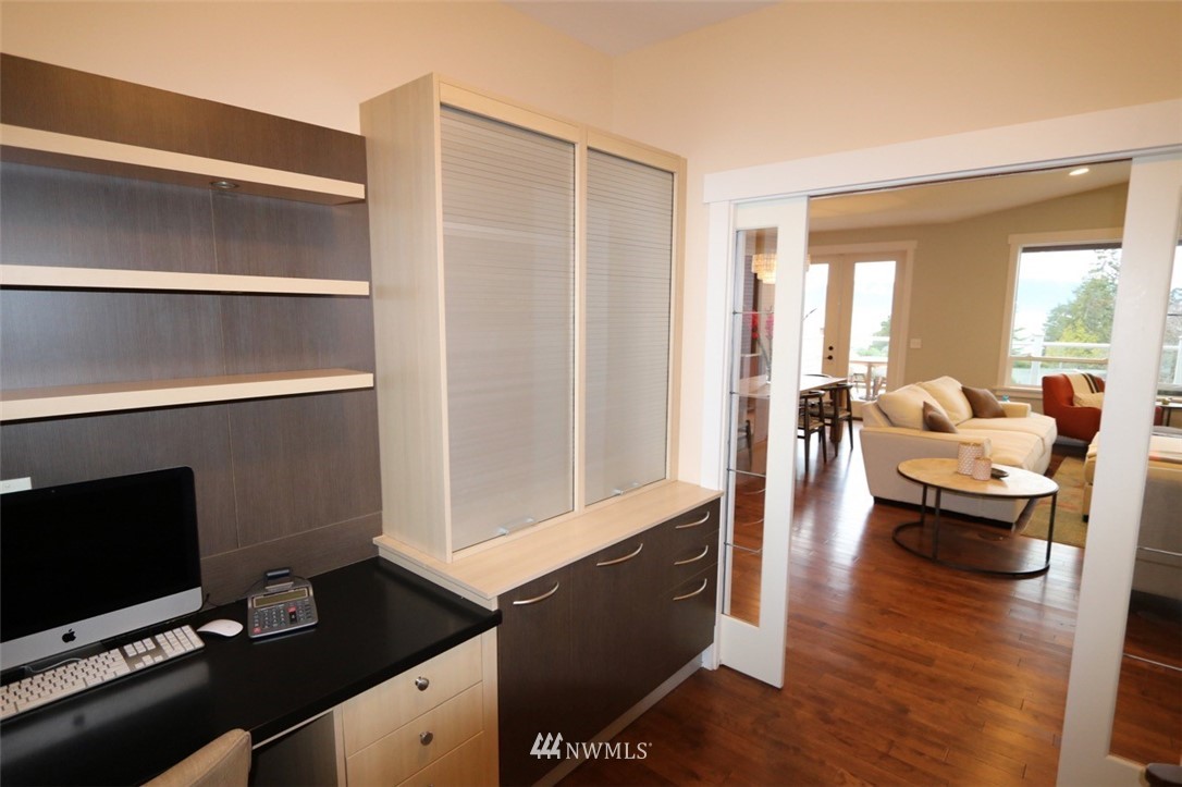 530 Briar Road Bellingham, WA 98225 - Photo 10 of 40 a living room with furniture and a flat screen tv