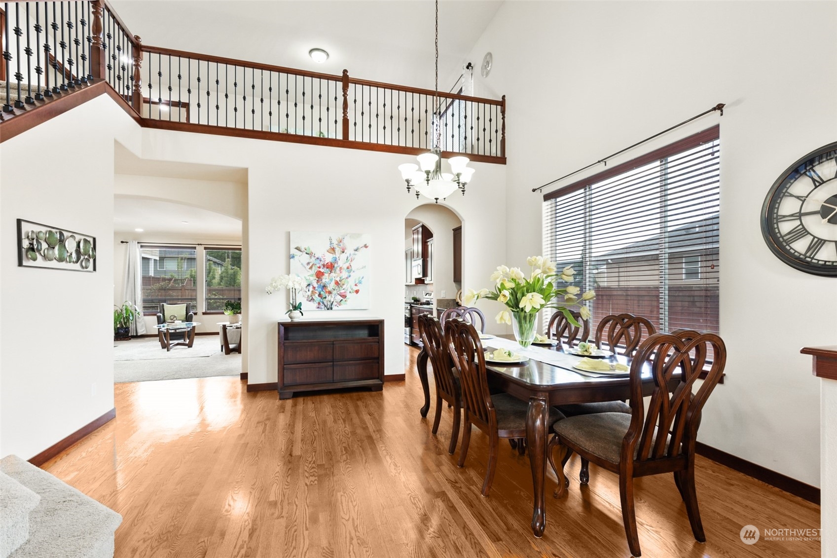 4114 222nd Place Southeast Bothell, WA 98021 - Photo 3 of 39 a view of a dining room with furniture window and wooden floor