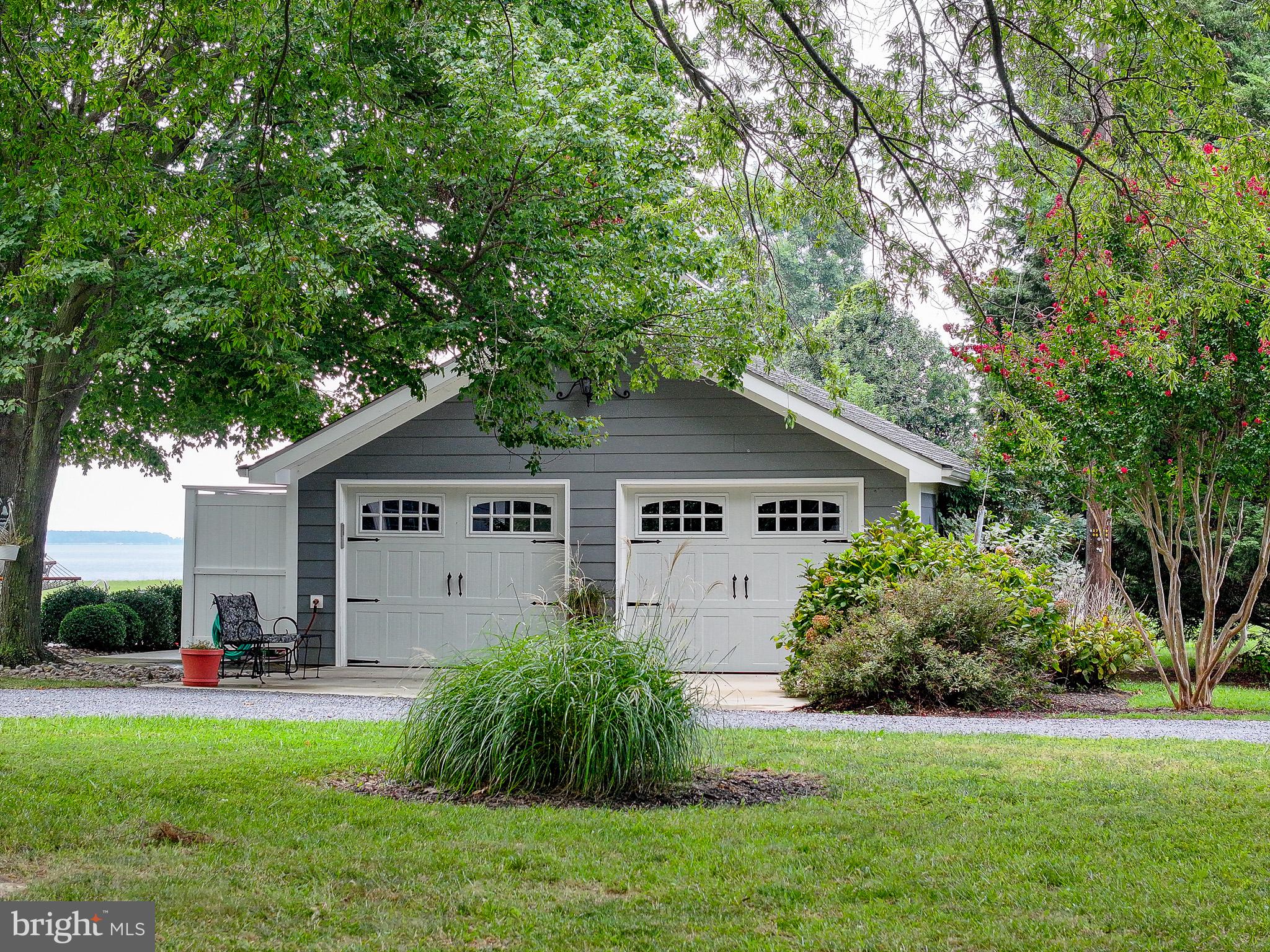 5995 Elston Shore Road Neavitt, MD 21652 - Photo 35 of 42 Charming garage nestled in greenery.