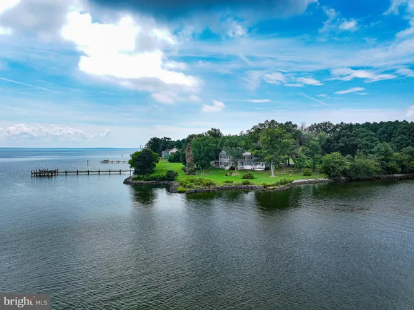 a view of lake with green space