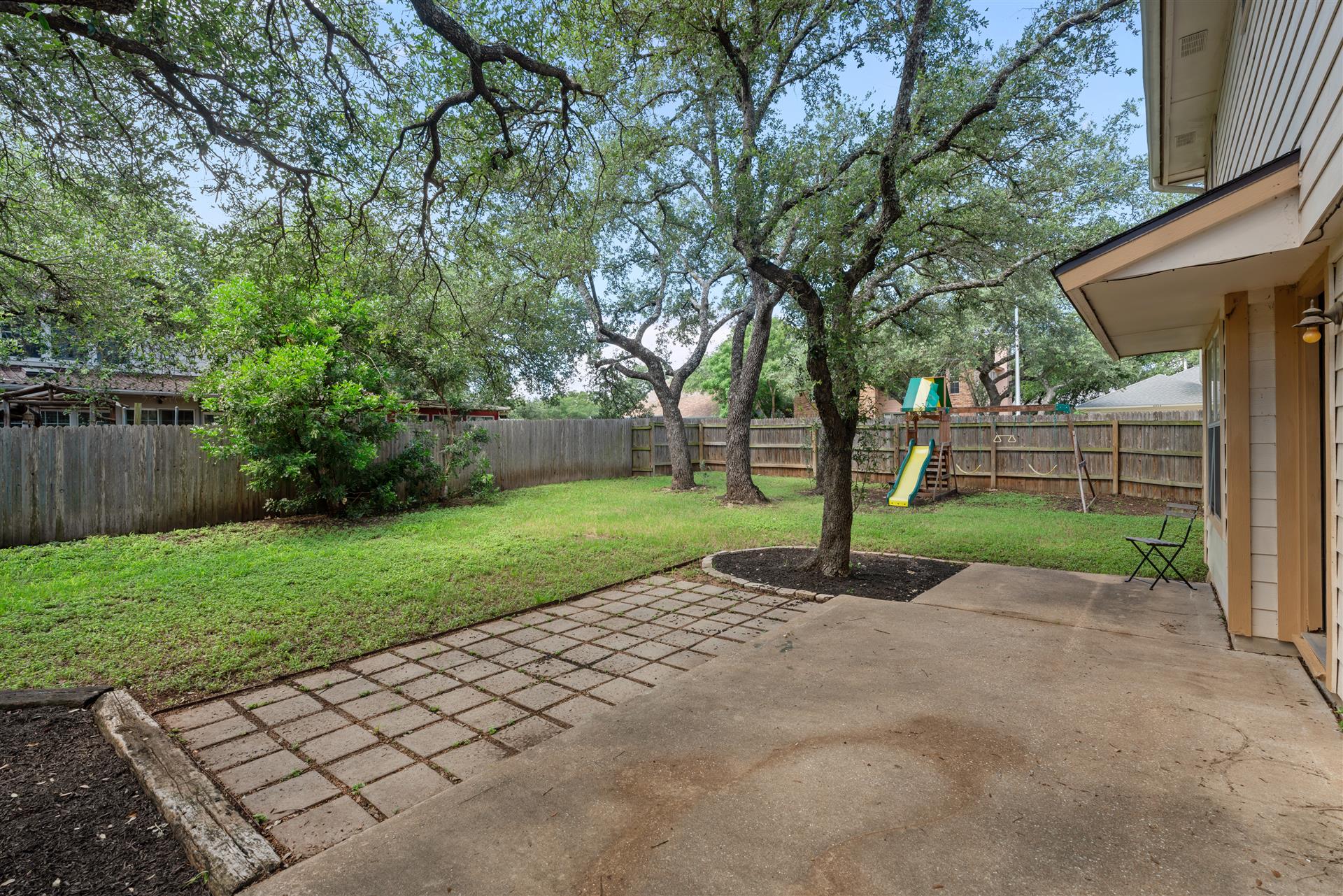 1710 Persimmon Road Cedar Park, TX 78613 - Photo 29 of 33 A perfect backyard for kids to play, four-legged family members to run around, and host family and friends for a backyard BBQ.