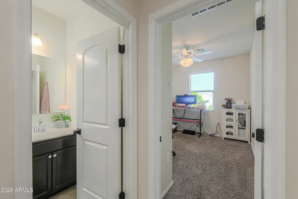 a view of kitchen and bathroom with a sink