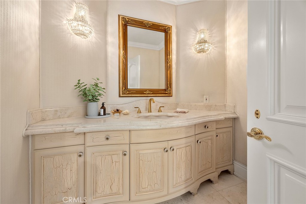 2112 Indian Creek Road Diamond Bar, CA 91765 - Photo 17 of 72 a bathroom with a sink and a mirror