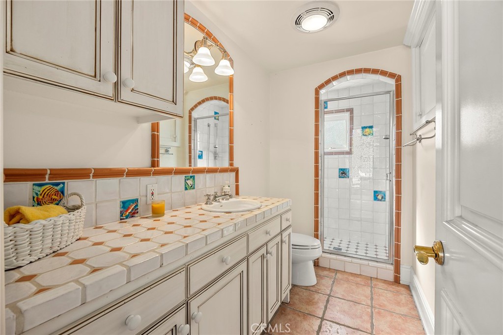 2112 Indian Creek Road Diamond Bar, CA 91765 - Photo 41 of 72 a bathroom with a sink a toilet and shower