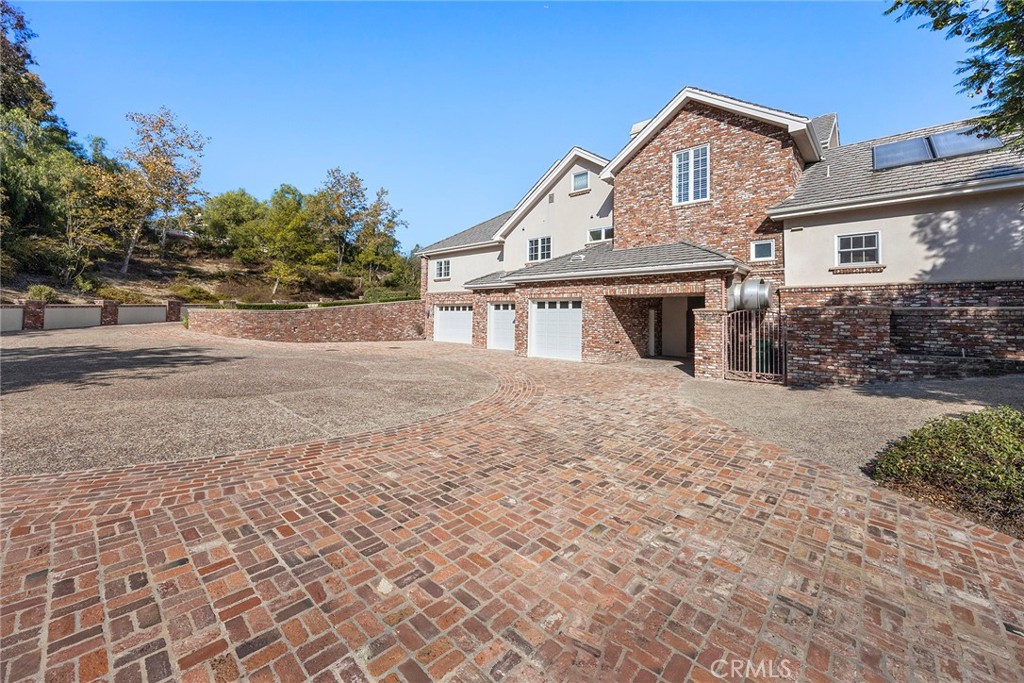 2112 Indian Creek Road Diamond Bar, CA 91765 - Photo 47 of 72 a front view of a house with a garden