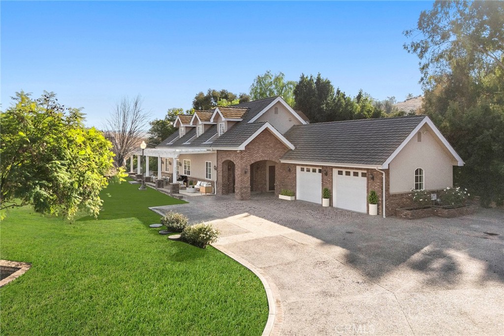 2112 Indian Creek Road Diamond Bar, CA 91765 - Photo 49 of 72 a view of house with garden