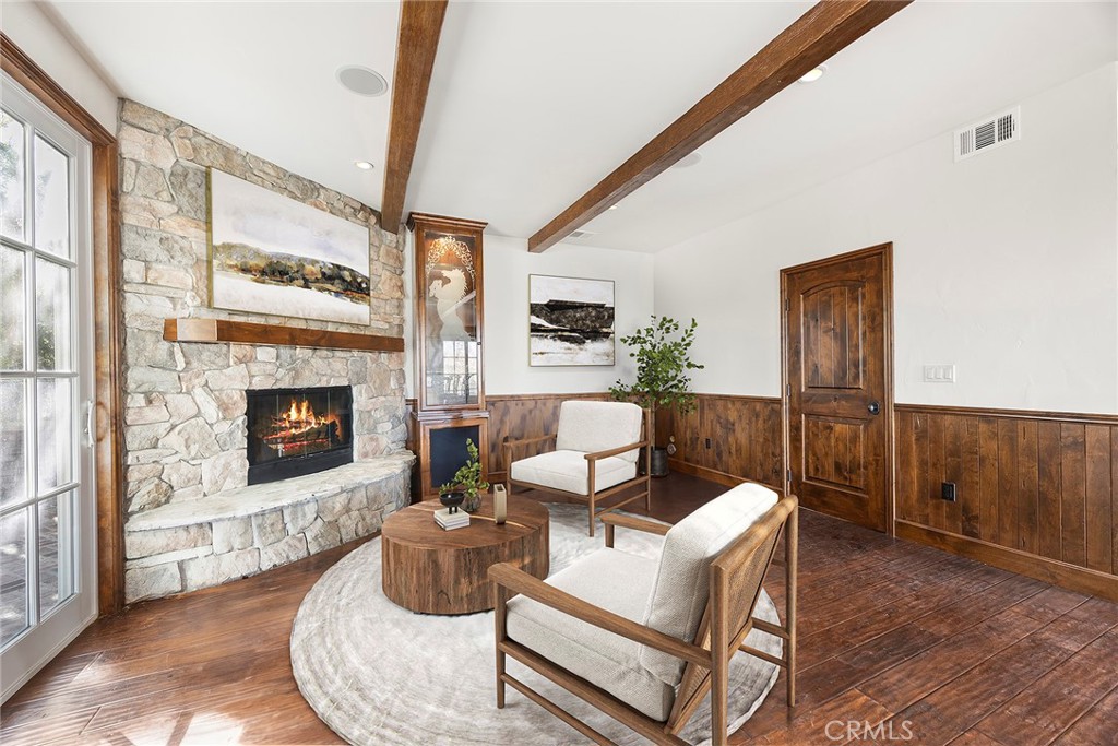 2112 Indian Creek Road Diamond Bar, CA 91765 - Photo 53 of 72 a living room with furniture a fireplace and a large window