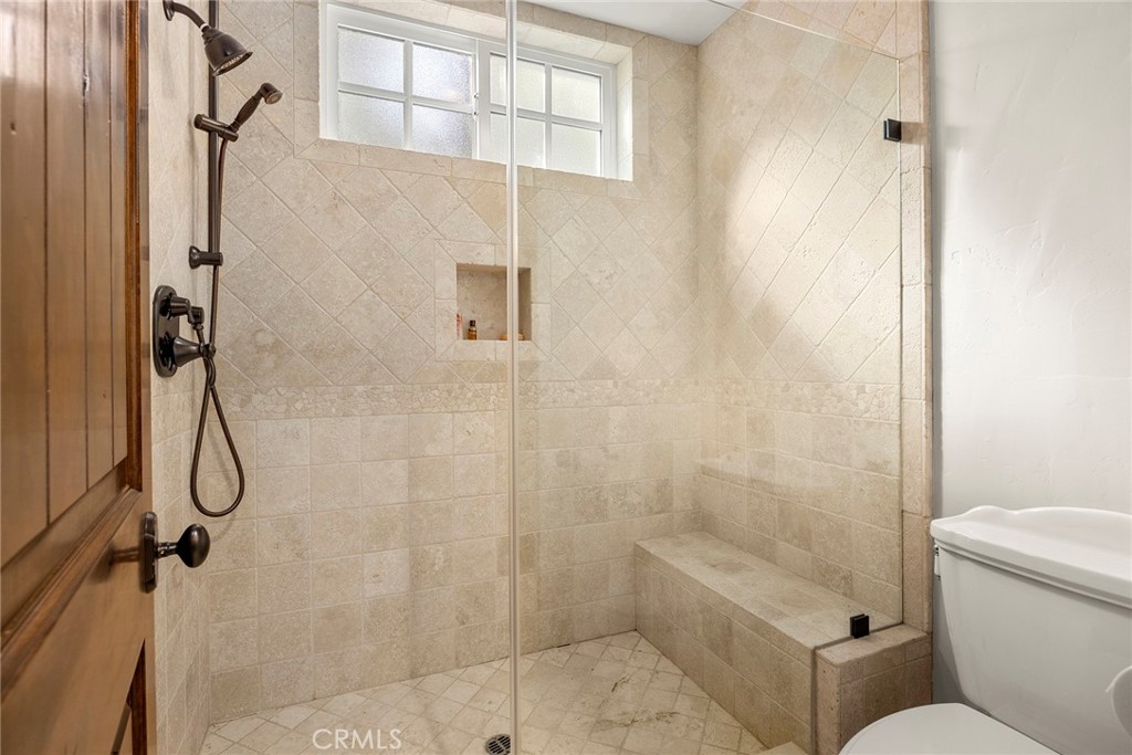 2112 Indian Creek Road Diamond Bar, CA 91765 - Photo 55 of 72 a bathroom with a shower and a toilet