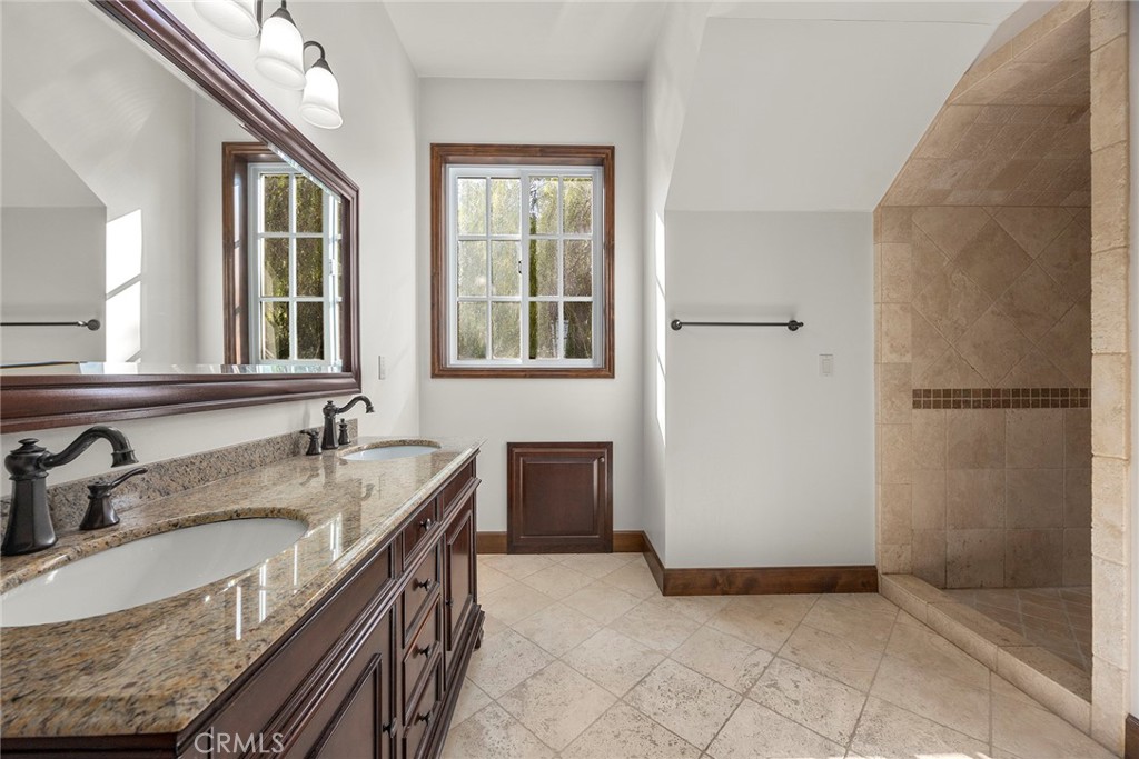 2112 Indian Creek Road Diamond Bar, CA 91765 - Photo 60 of 72 a kitchen with granite countertop a sink stove and refrigerator