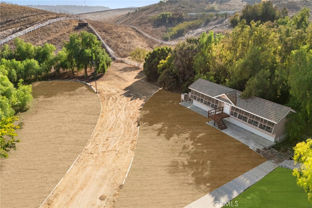 2112 Indian Creek Road Diamond Bar, CA 91765 - Photo 64 of 72 an aerial view of a house with a yard and mountain view in back