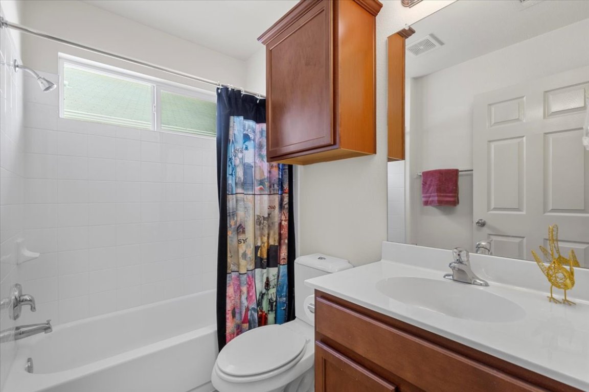 12500 Timber Heights Drive Austin, TX 78754 - Photo 20 of 31 a bathroom with a sink toilet and shower