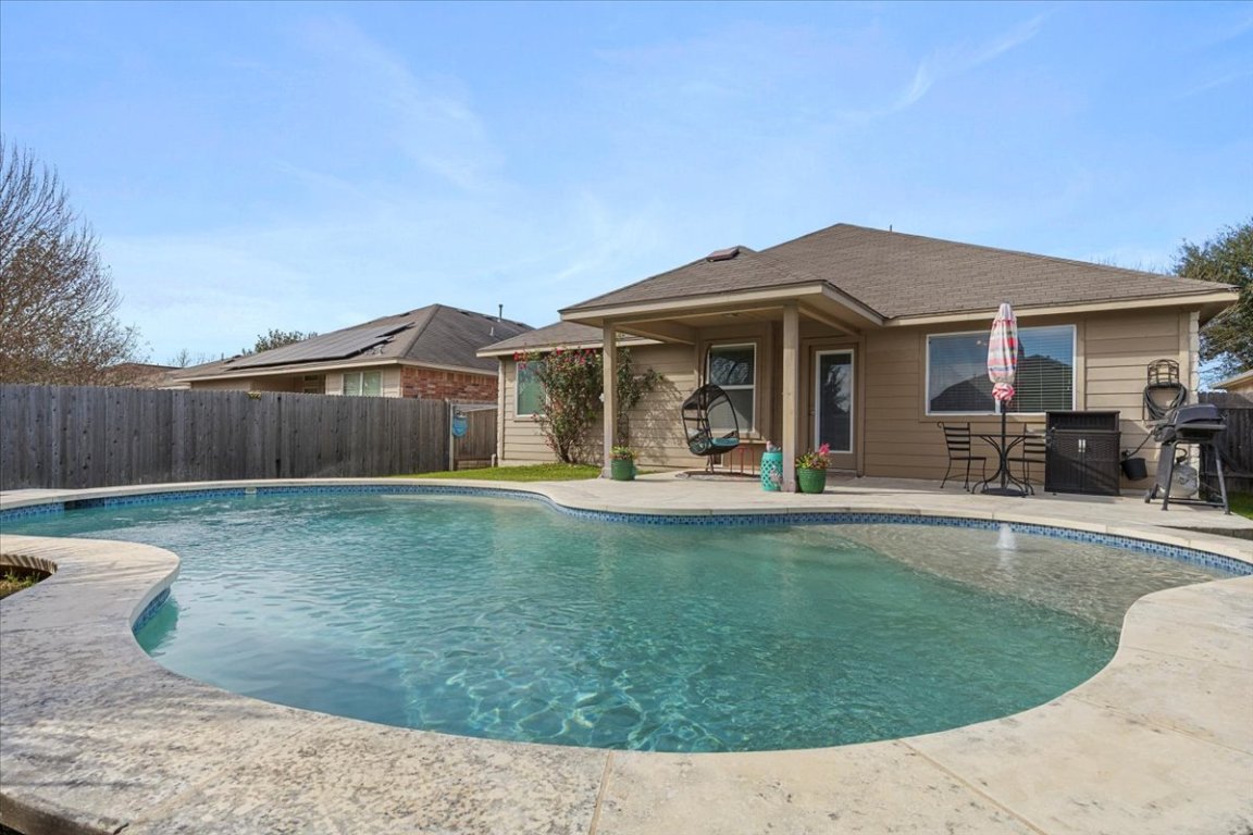 12500 Timber Heights Drive Austin, TX 78754 - Photo 24 of 31 a view of a house with backyard porch and furniture