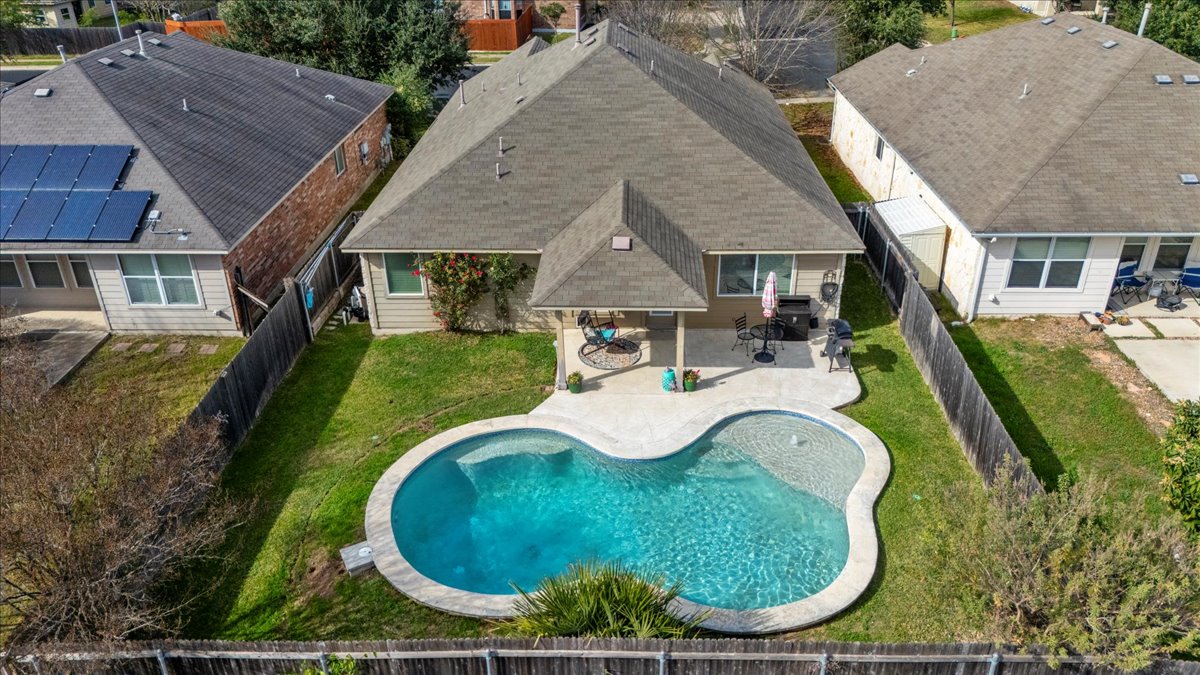12500 Timber Heights Drive Austin, TX 78754 - Photo 28 of 31 an aerial view of a house with swimming pool and garden view