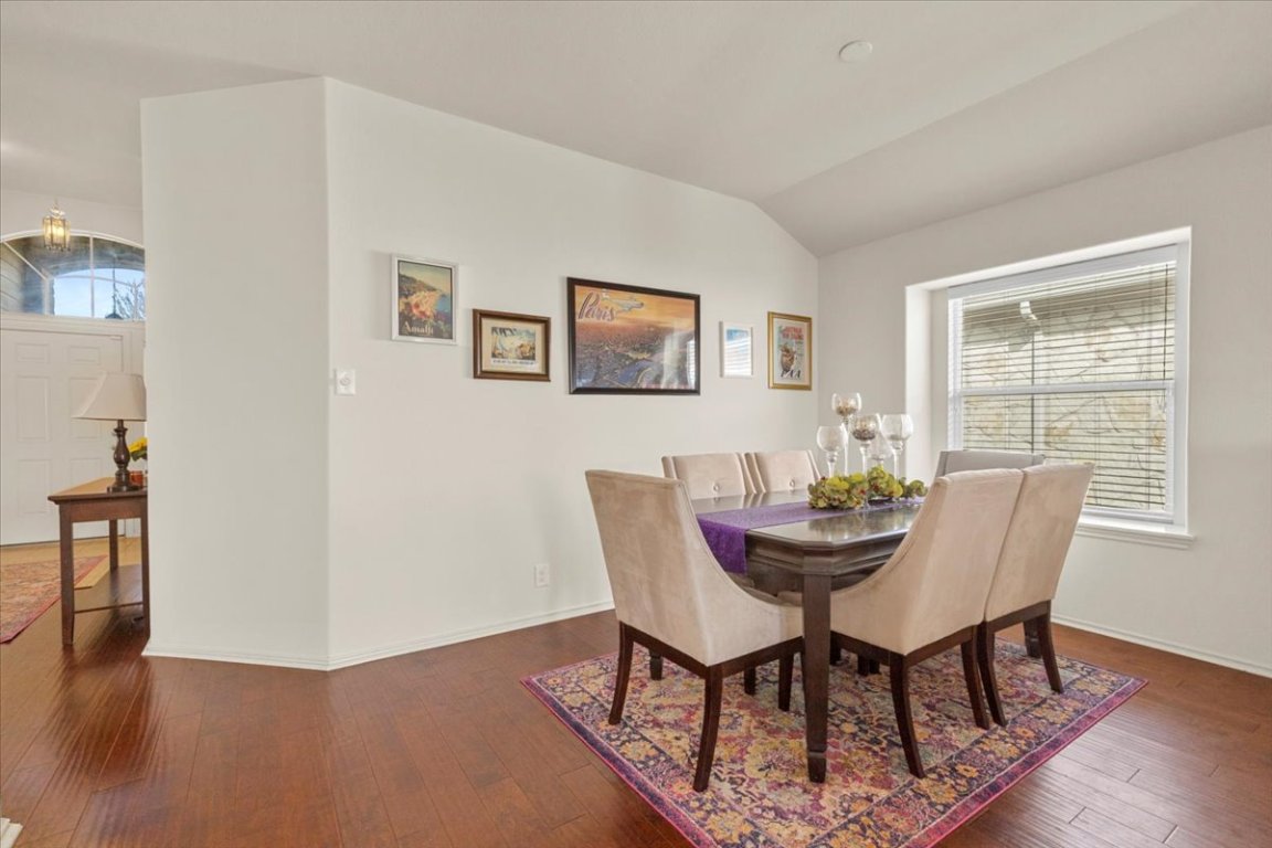 12500 Timber Heights Drive Austin, TX 78754 - Photo 6 of 31 a view of a dining room with furniture and wooden floor