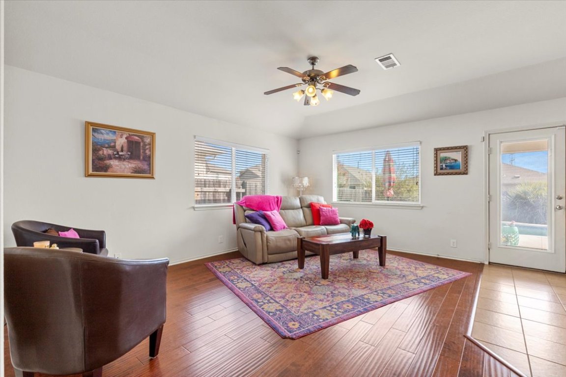 12500 Timber Heights Drive Austin, TX 78754 - Photo 8 of 31 a living room with furniture and a wooden floor