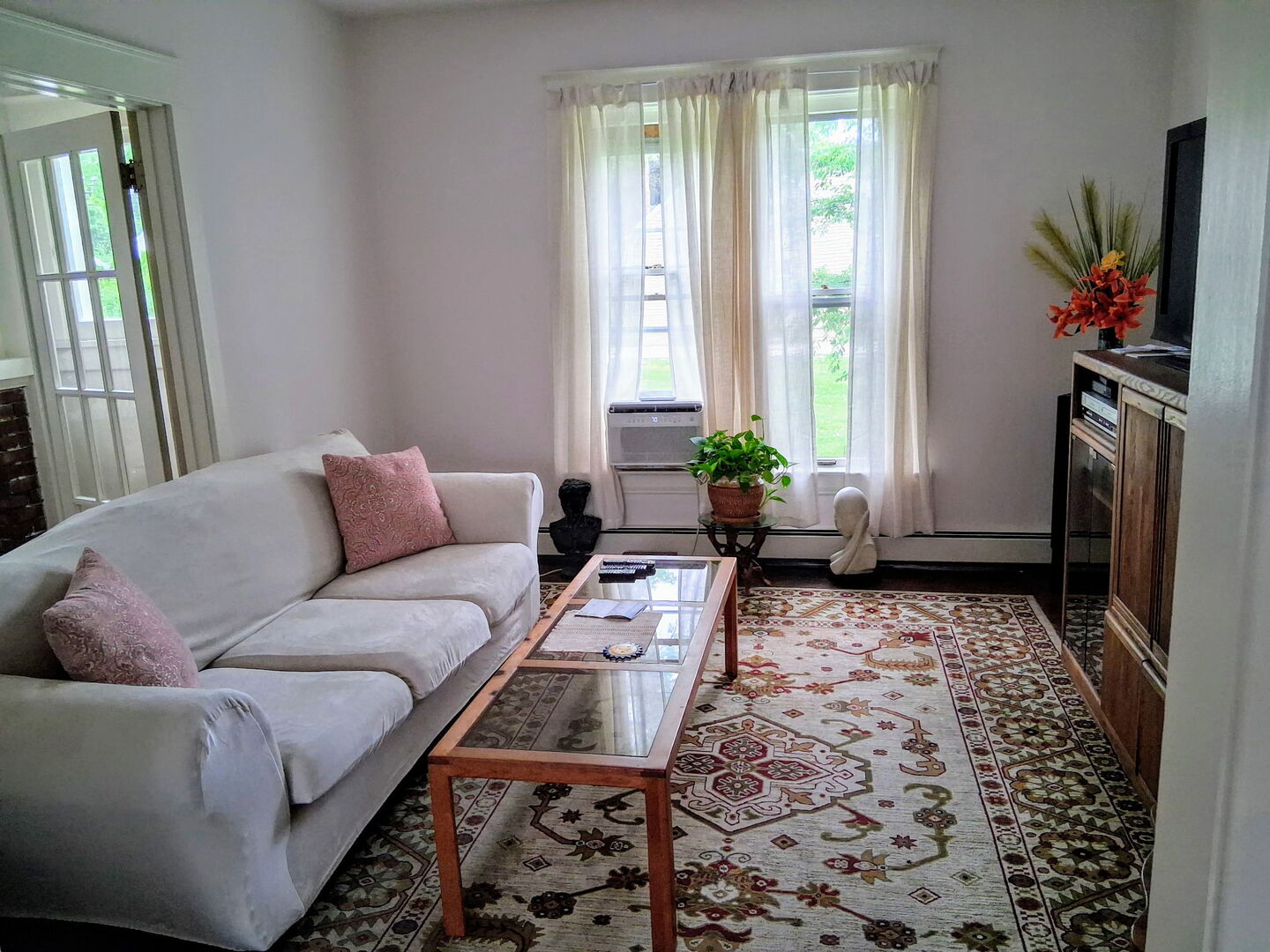 742 South 4th Street DeKalb, IL 60115 - Photo 12 of 46 a living room with furniture and a rug