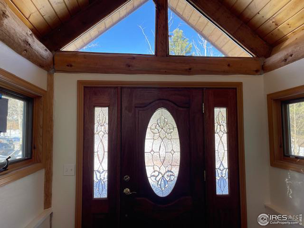 1820 Lazy Z Road Nederland, CO 80466 - Photo 5 of 27 Front Entrance. Living room and dining room with brick fireplace is yet to be photographed.