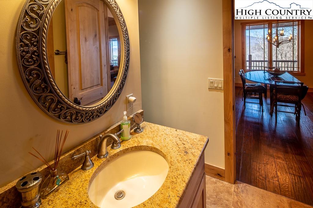 612 Bear Cubs Trail Boone, NC 28607 - Photo 27 of 37 a bathroom with a mirror and a sink
