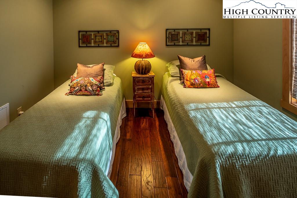 612 Bear Cubs Trail Boone, NC 28607 - Photo 29 of 37 a bedroom with a bed and dresser