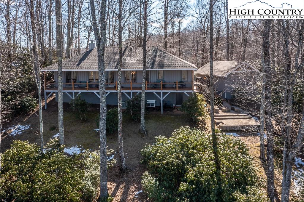 612 Bear Cubs Trail Boone, NC 28607 - Photo 6 of 37 a aerial view of a house with swimming pool and sitting area