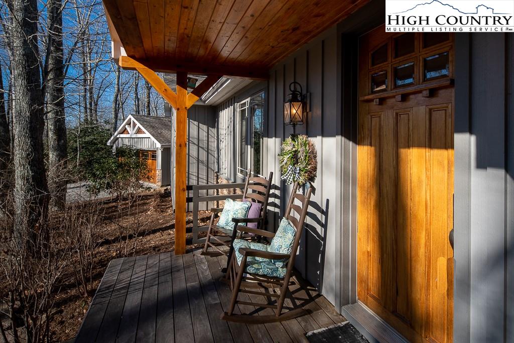 612 Bear Cubs Trail Boone, NC 28607 - Photo 7 of 37 a front view of a house with outdoor seating