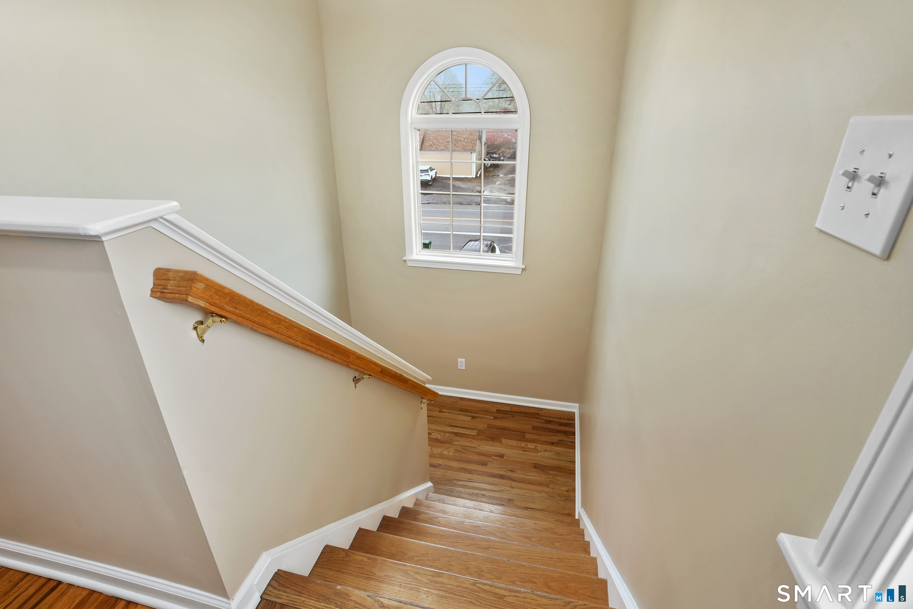 1180 Main Street Stratford, CT 06615 - Photo 15 of 22 a view of entryway with wooden floor