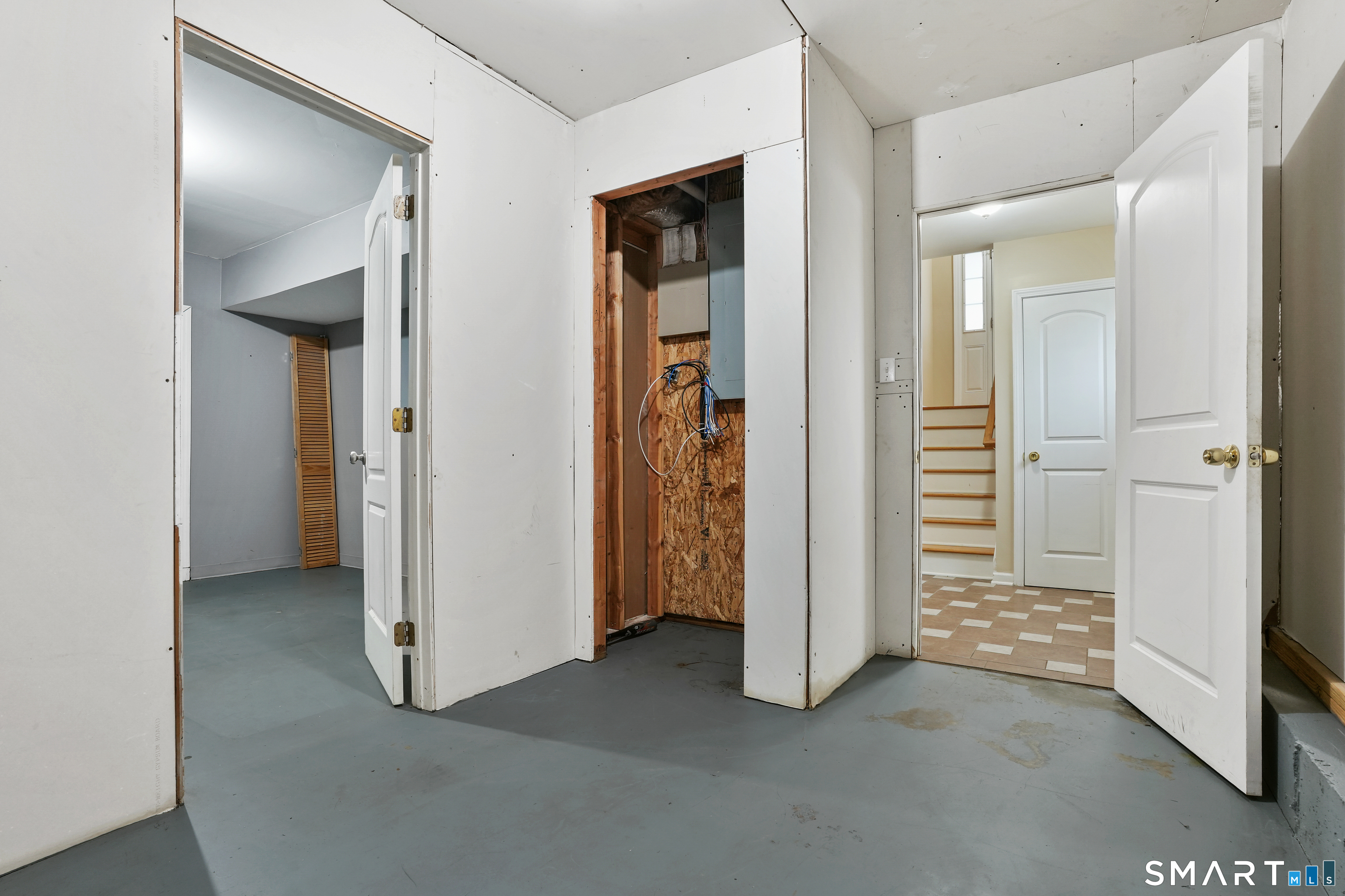 1180 Main Street Stratford, CT 06615 - Photo 16 of 22 wooden floor and closet in a room