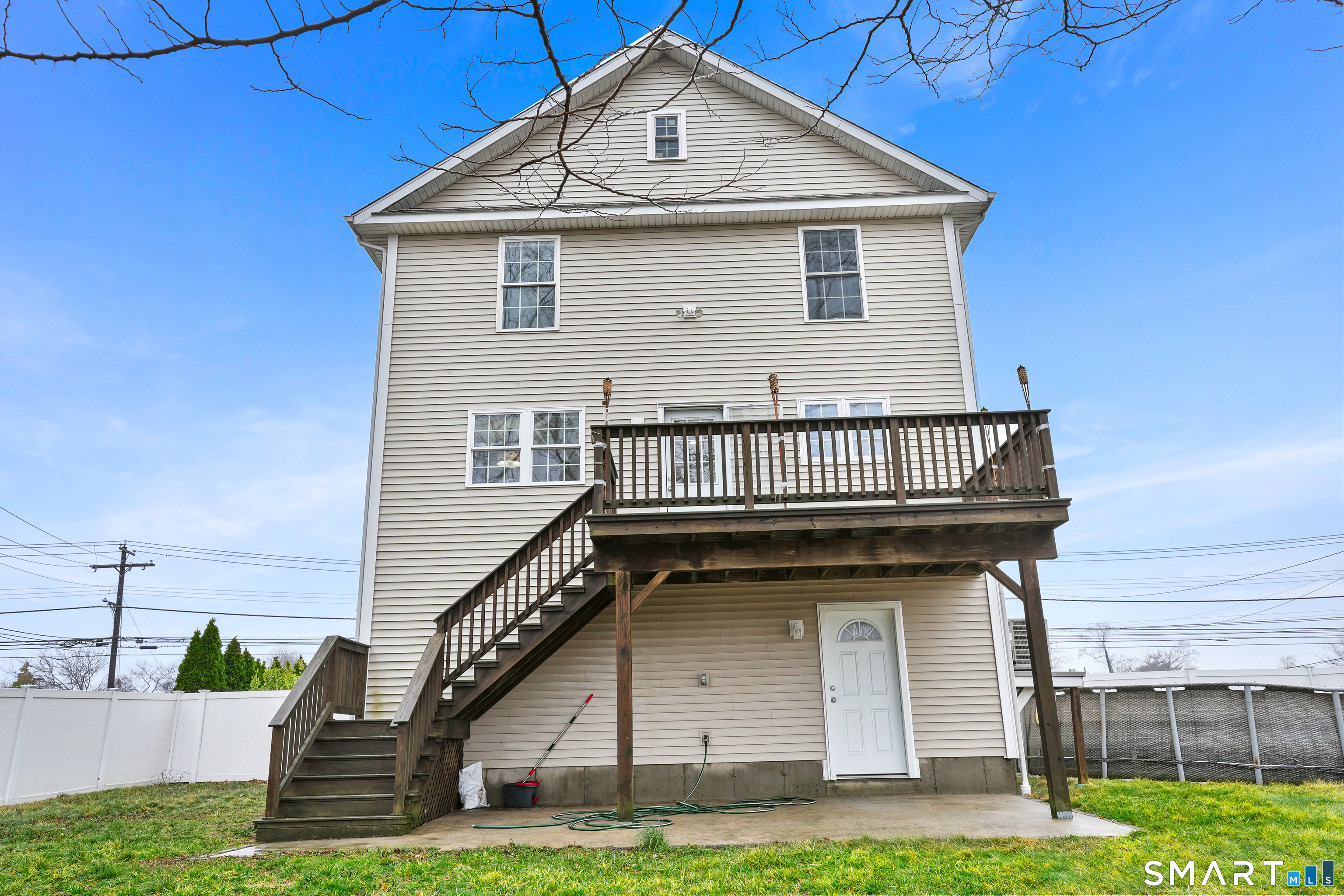 1180 Main Street Stratford, CT 06615 - Photo 17 of 22 a front view of a house with garden