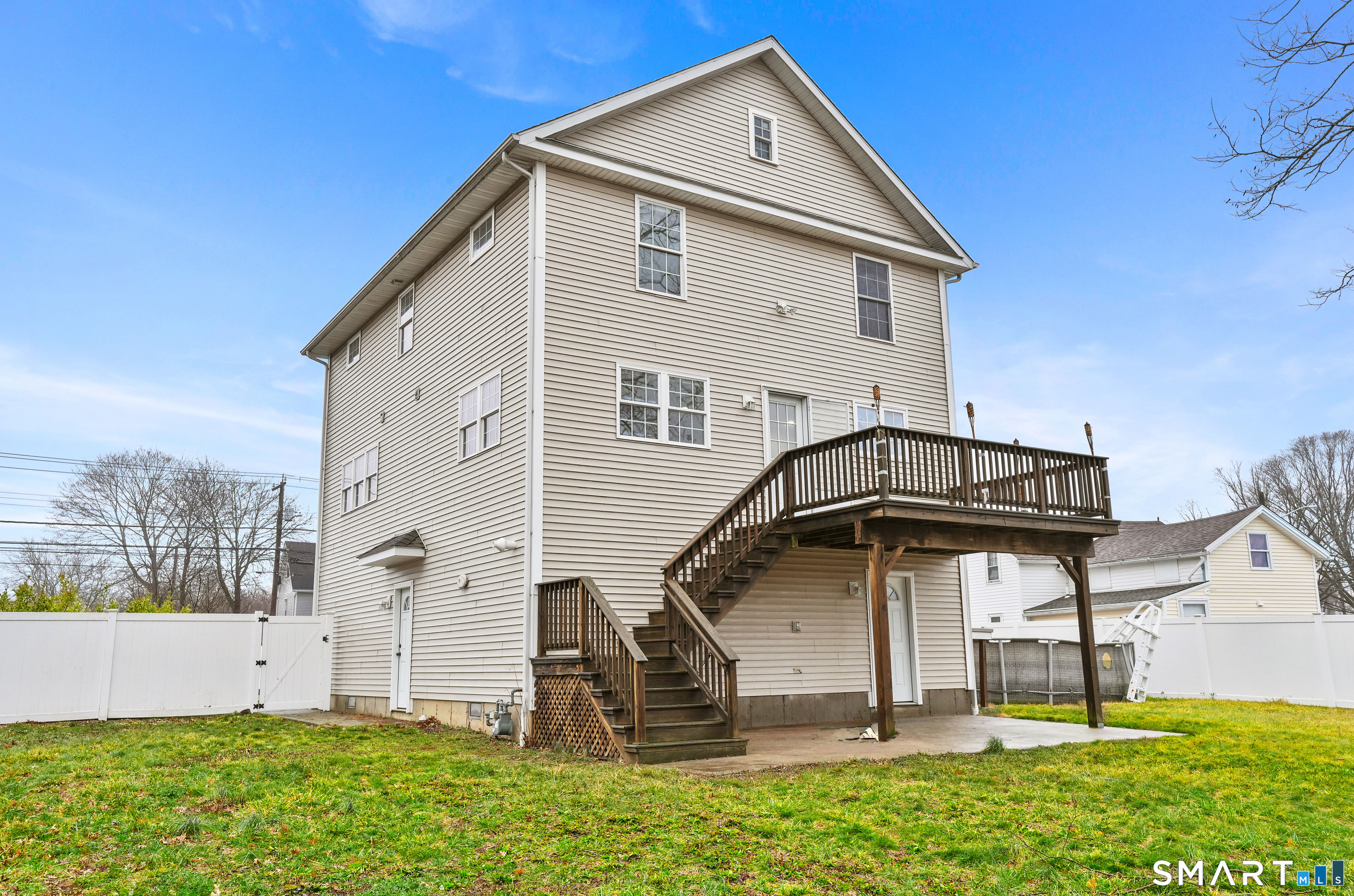 1180 Main Street Stratford, CT 06615 - Photo 20 of 22 a view of a house with a yard