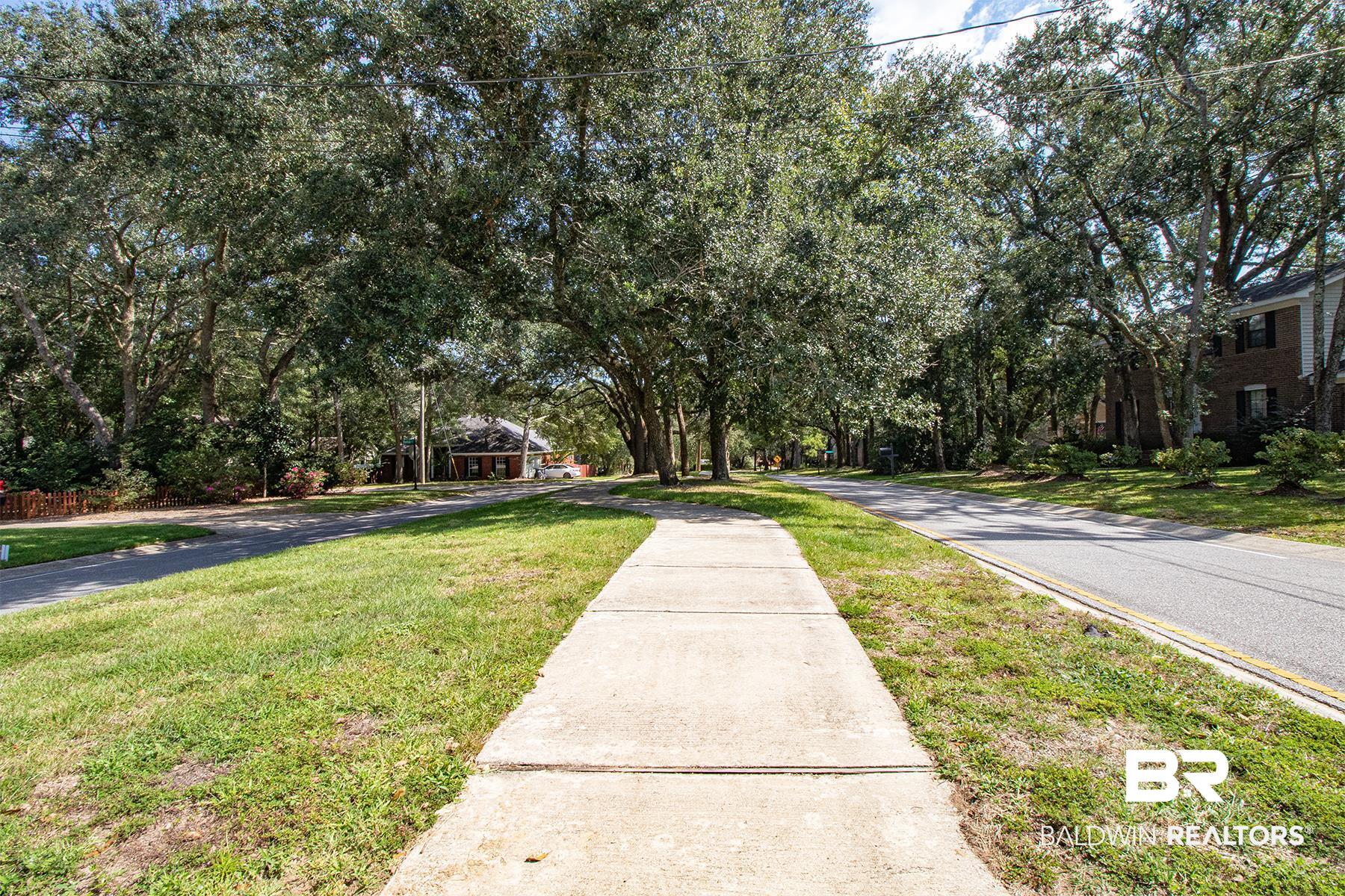 209 Montclair Loop Daphne, AL 36526 - Photo 51 of 55 View of asphalt road featuring sidewalks