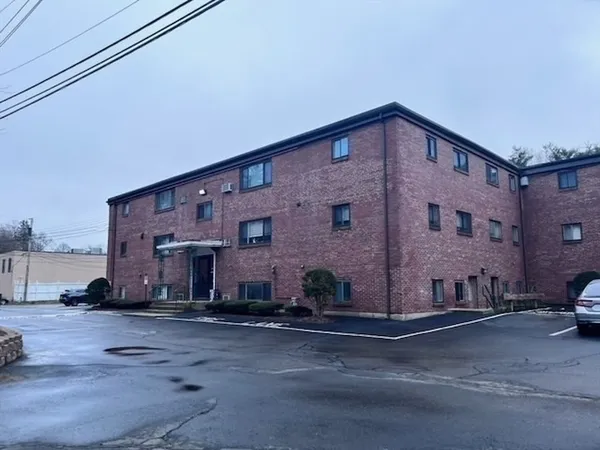 a view of a building with a street