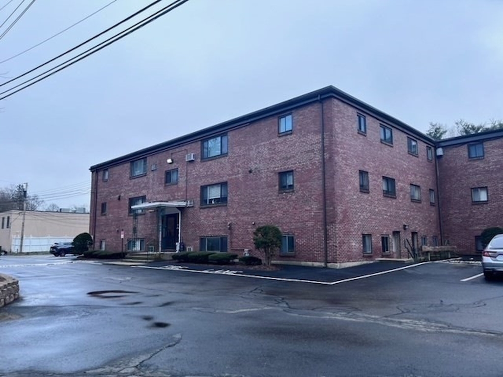 a view of a building with a street