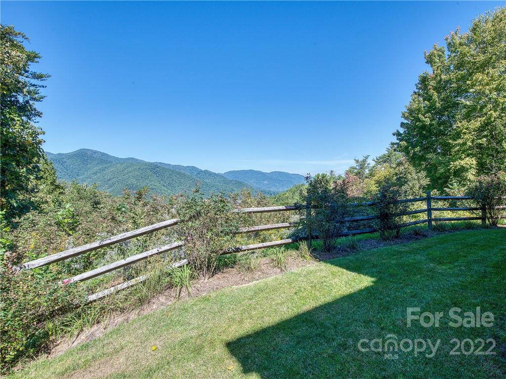 406 Blue Vista Road Canton, NC 28716 - Photo 3 of 48 a view of a backyard with a garden