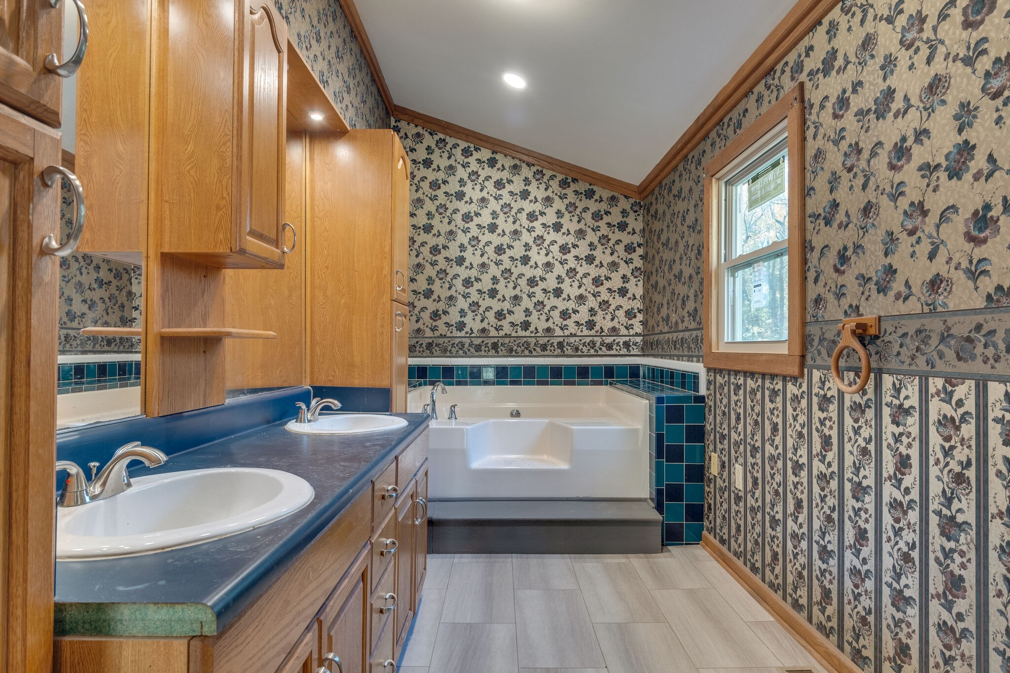 409 Elora Road Elora, TN 37328 - Photo 23 of 25 a bathroom with a sink a bathtub and a shower