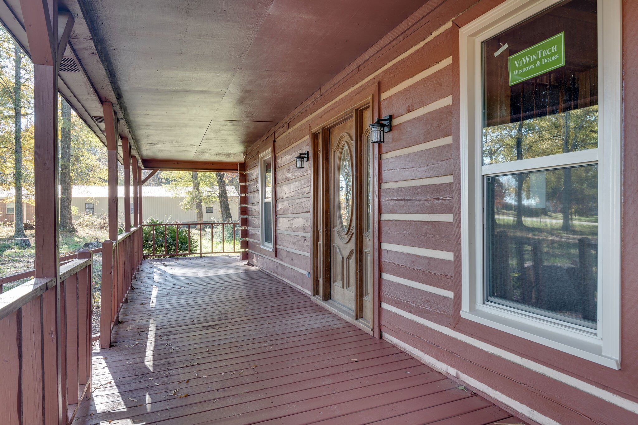 409 Elora Road Elora, TN 37328 - Photo 9 of 25 a view of a porch with wooden floor and furniture