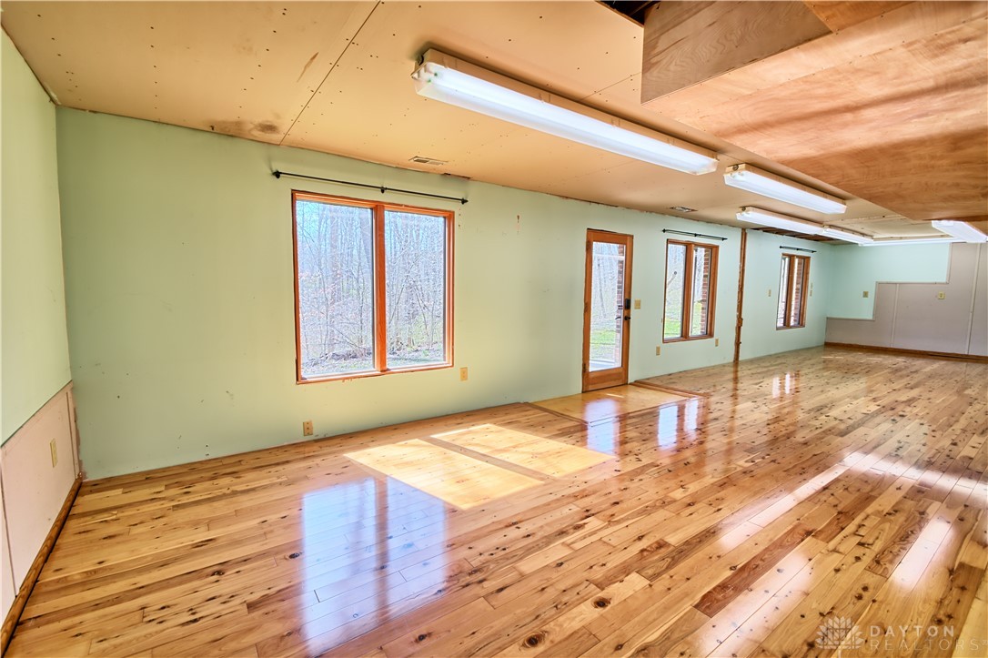8711 Nicole Lane Springboro, OH 45066 - Photo 67 of 87 This spacious interior offers abundant natural light and durable hardwood flooring.