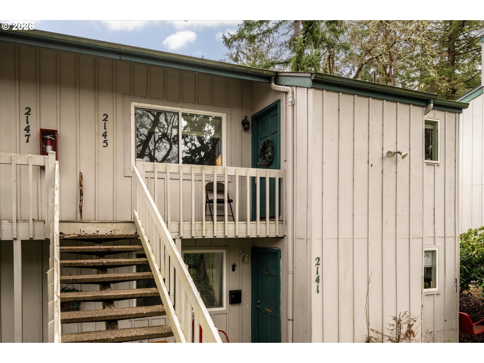 2145 Hawkins Lane Eugene, OR 97405 - Photo 1 of 38 a view of entryway with wooden floor