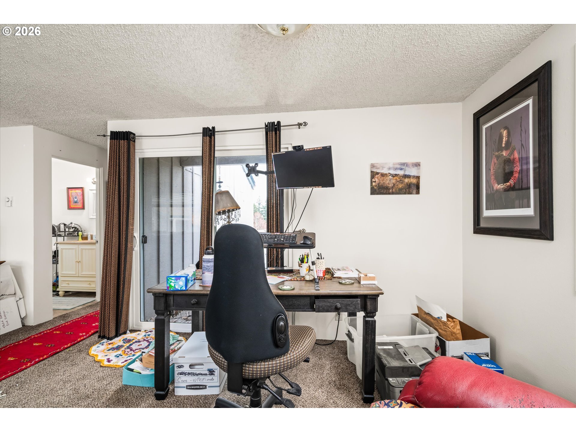2145 Hawkins Lane Eugene, OR 97405 - Photo 12 of 38 a workspace with furniture and rug