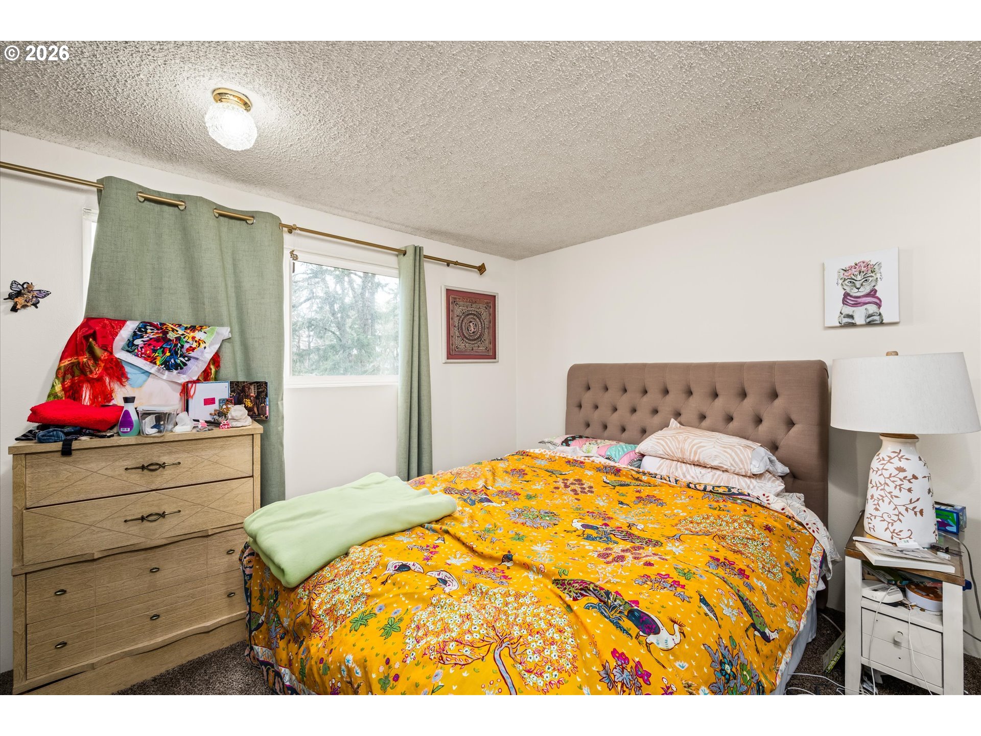 2145 Hawkins Lane Eugene, OR 97405 - Photo 13 of 38 a bedroom with a bed and window