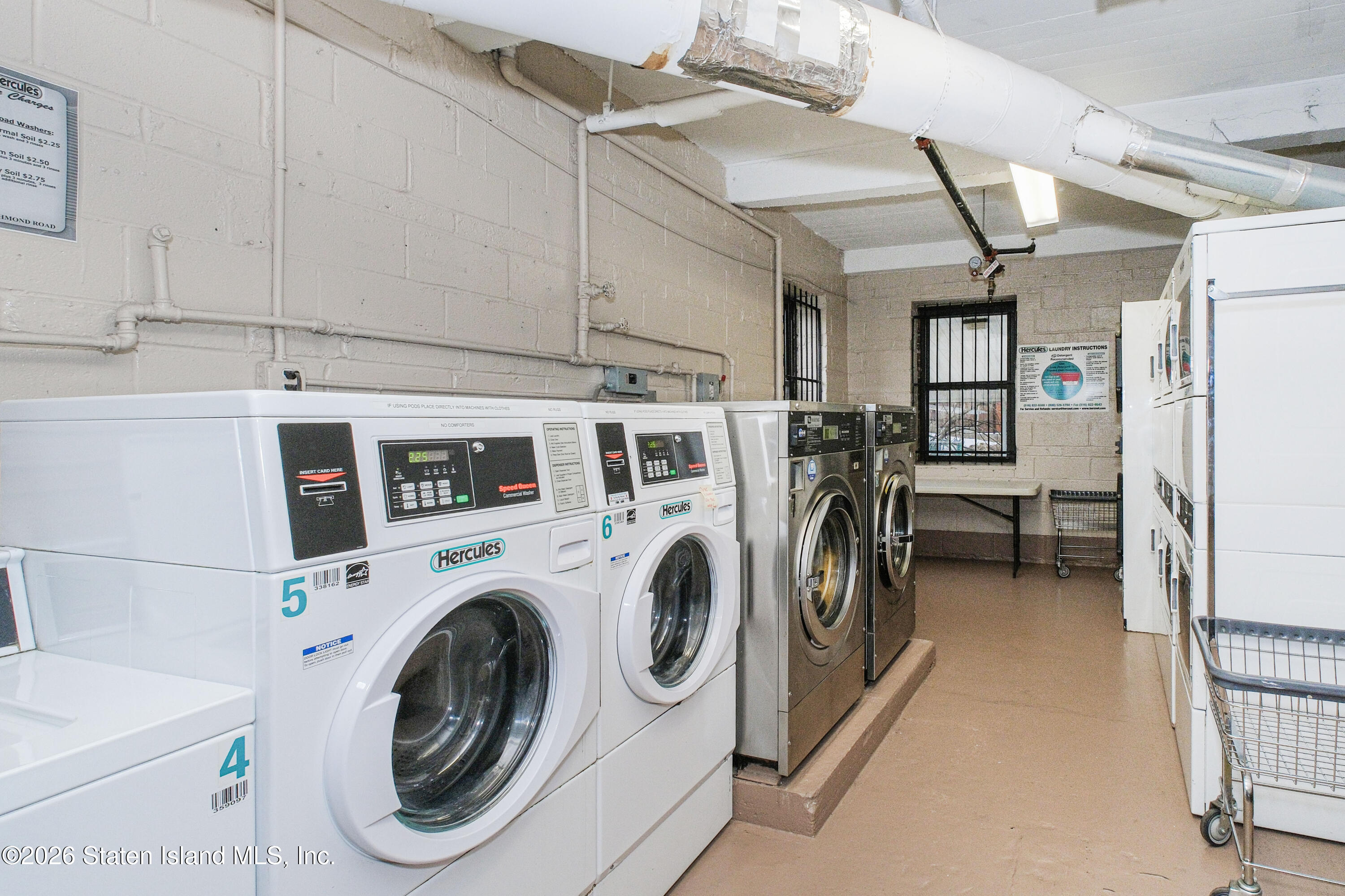 1160 Richmond Road, Unit 4G Staten Island, NY 10304 - Photo 12 of 14 a utility room with dryer and washer