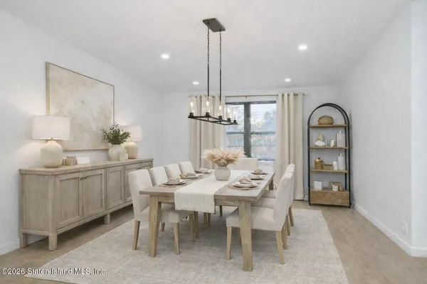 a view of a dining room with furniture