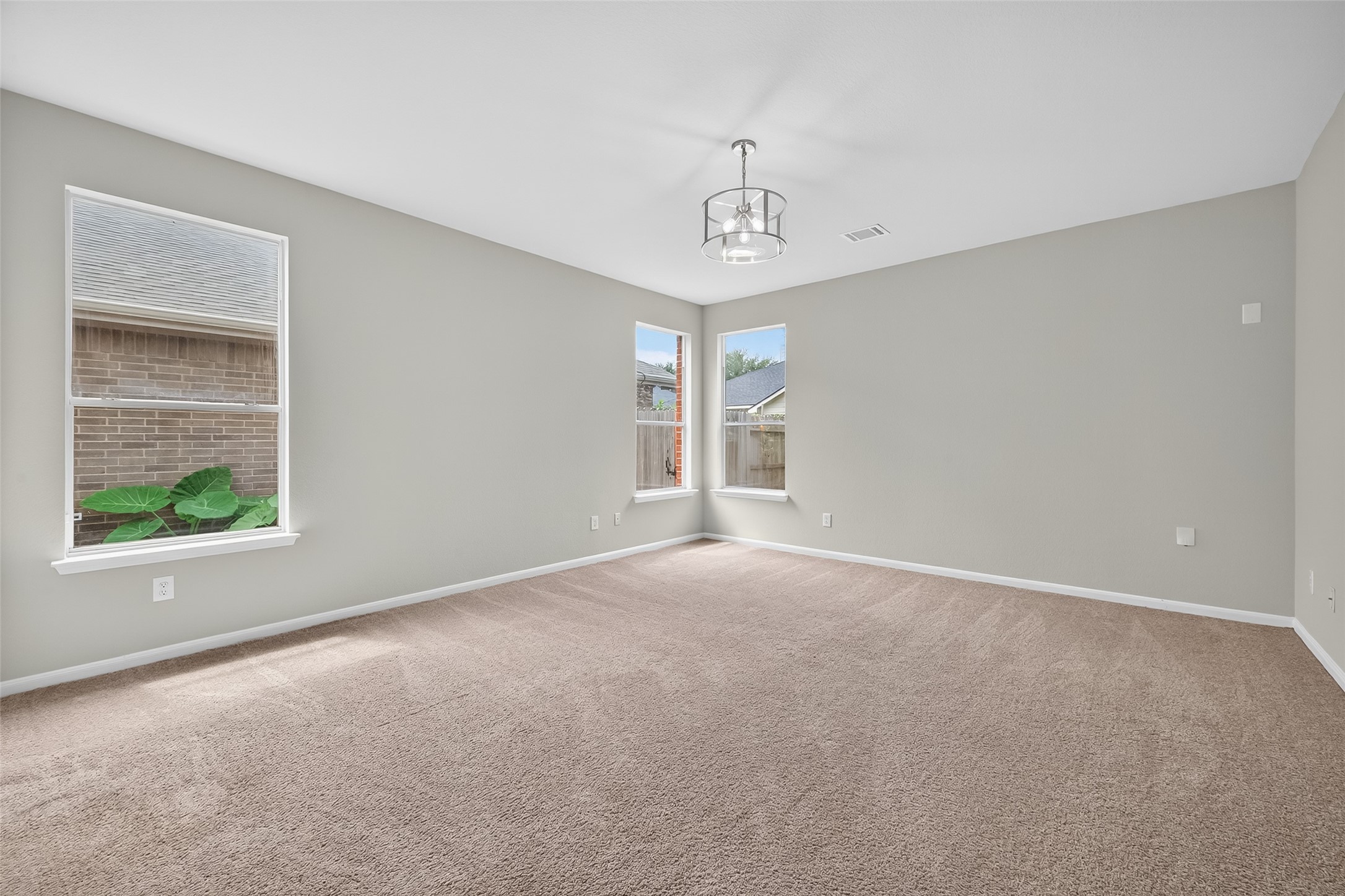 1302 Cross Draw Drive Houston, TX 77067 - Photo 16 of 35 a view of an empty room with a window