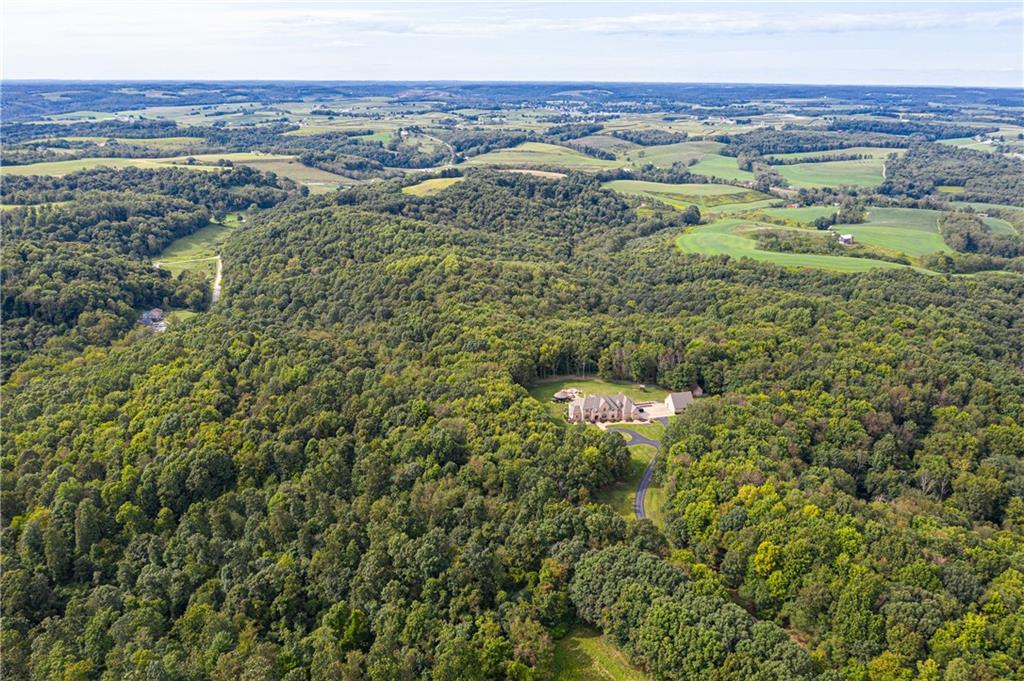 1801 Freeport Road Kittanning, PA 16201 - Photo 18 of 36 a view of a city with lush green forest