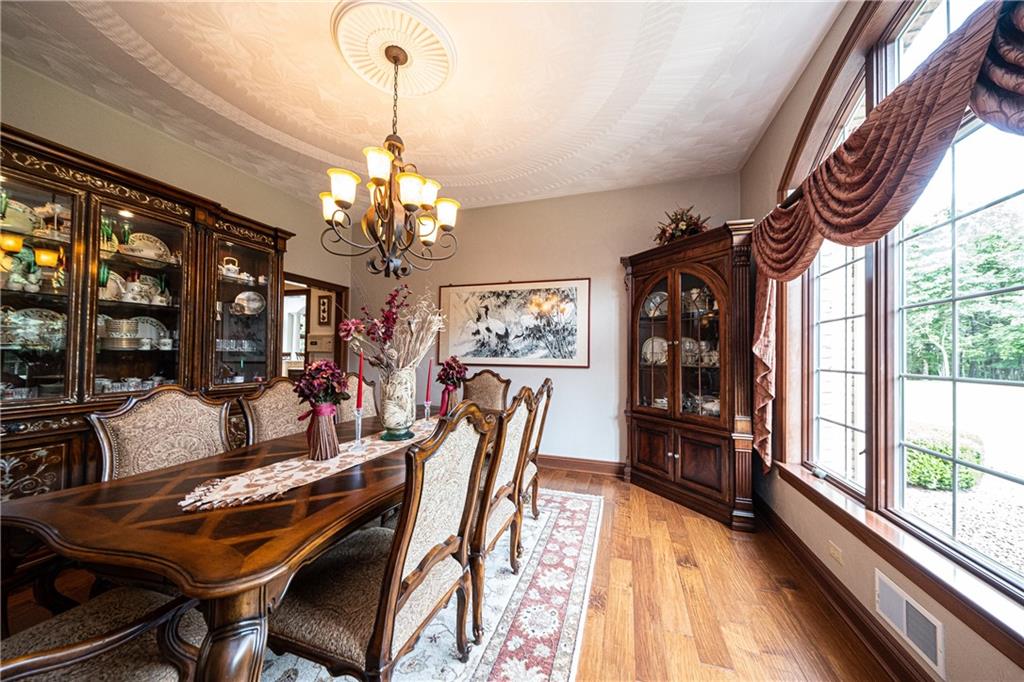 1801 Freeport Road Kittanning, PA 16201 - Photo 21 of 36 a view of a dining room with furniture wooden floor and chandelier